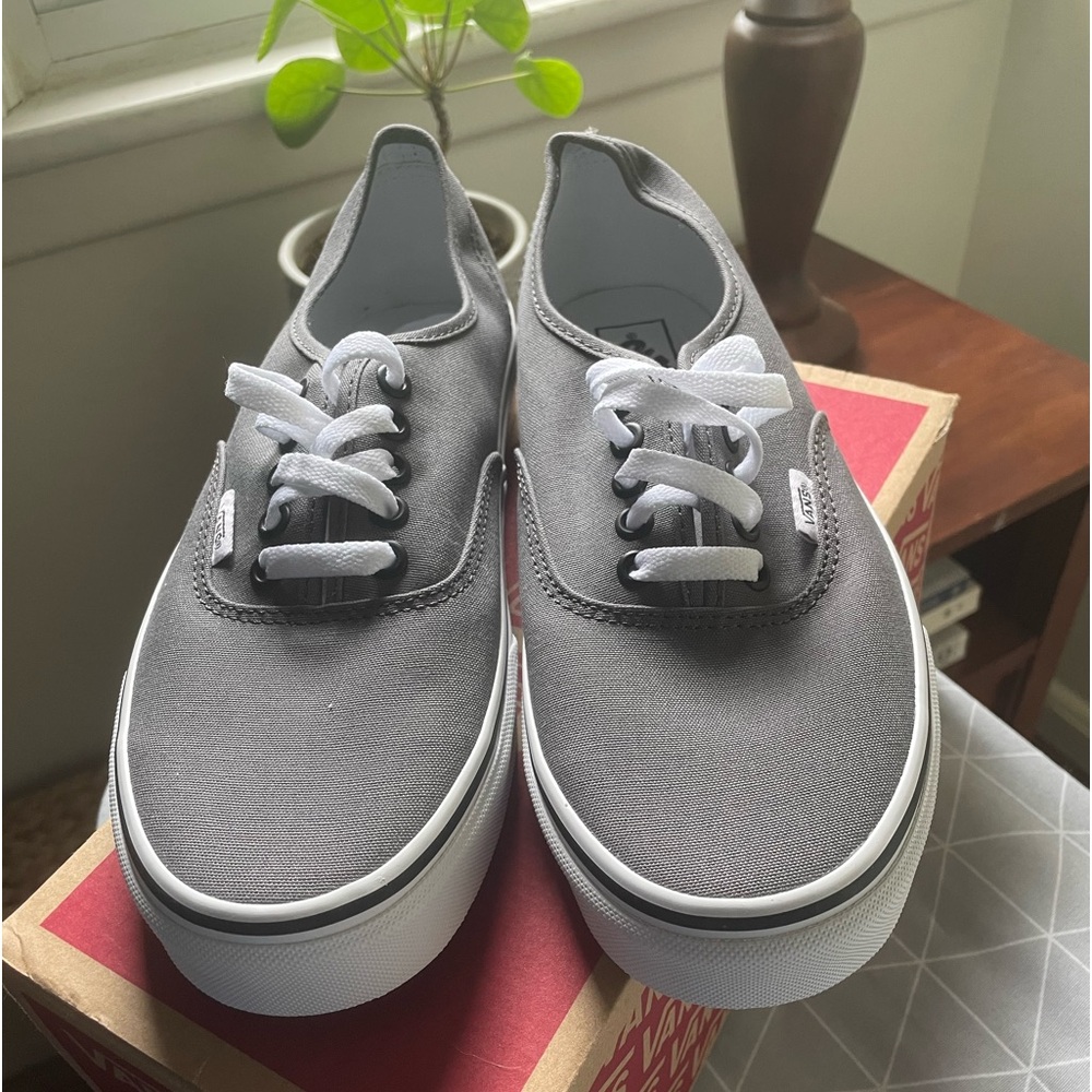 Gray unisex Vans.